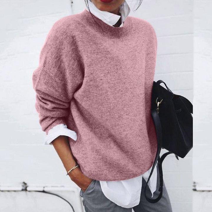 Cozy long sleeve round neck pullover sweater for women, ideal for everyday feminine wear.