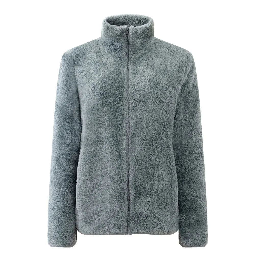 Warm women's outdoor winter coat. Soft, cozy, and comfortable everyday jacket for cold weather.
