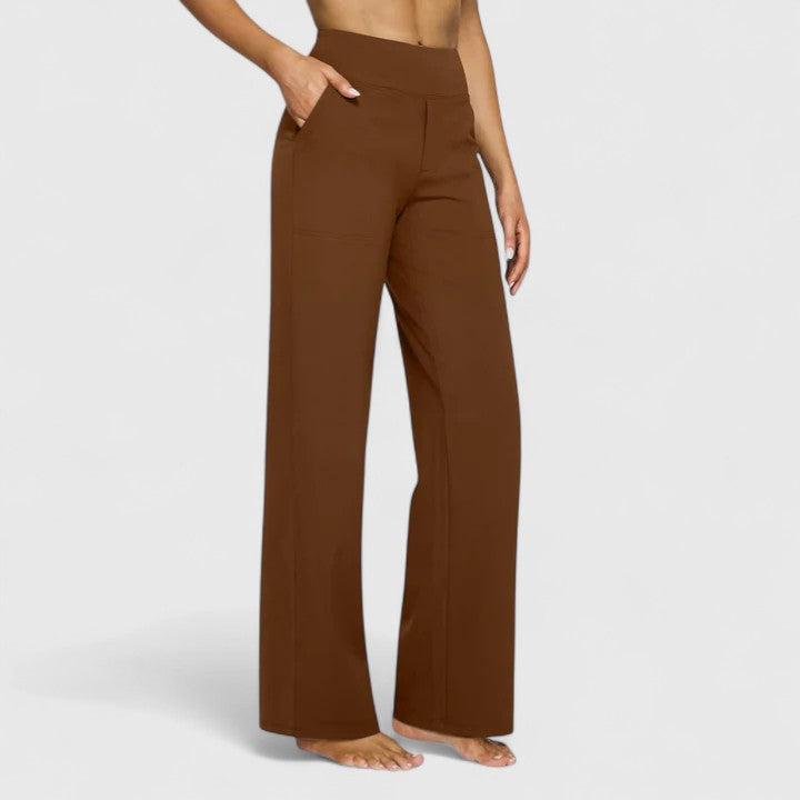 Women's sophisticated pull-on pants paired with a blouse, creating an effortless & elegant work attire outfit.