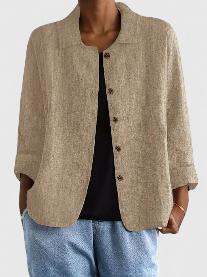 Transitional women's top, elegant for everyday wear, offering a comfortable and stylish look.
