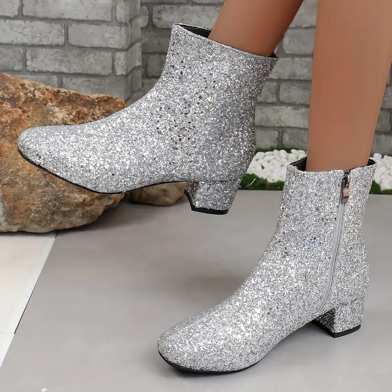 Elegant women's glitter heeled ankle boots, a sparkling statement shoe for parties & special occasions.