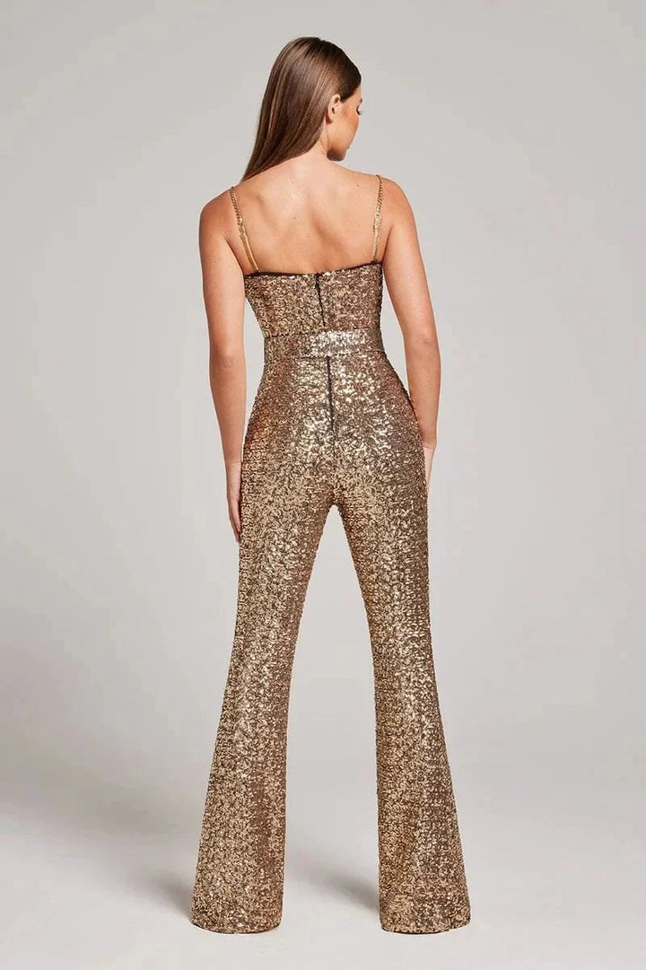 Women's sparkling glitter party jumpsuit with waist belt. Stylish two-piece set for evening.