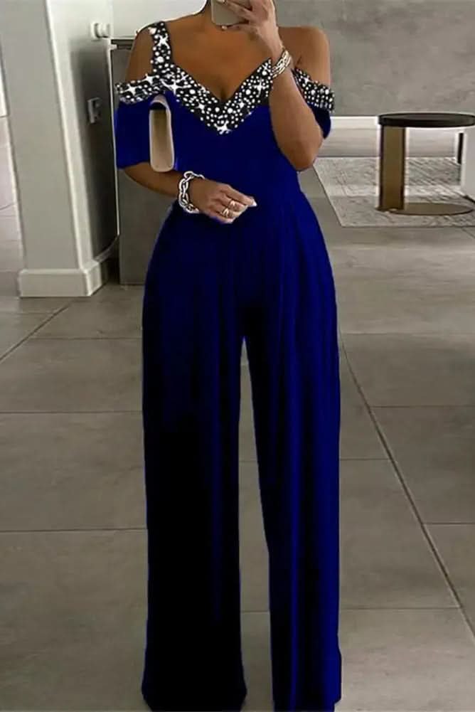 Elegant women's rhinestone jumpsuit with sparkling details, ideal for evening glamour & special occasions.