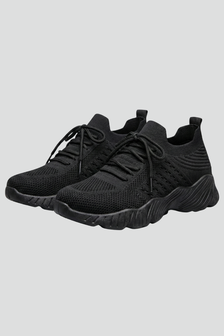 Women's sports shoes with laces & textured sole for walking, athletic wear, & everyday comfort.