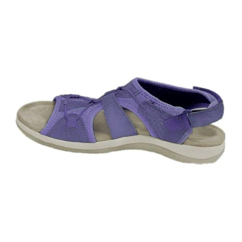 Close-up of sole texture on women's comfort sandals, providing grip for sporty spring outings.