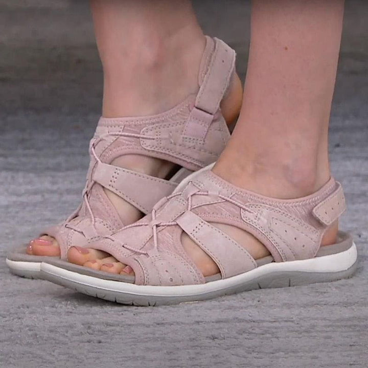 Women's strappy comfort sandals in a neutral color, suitable for everyday casual wear.