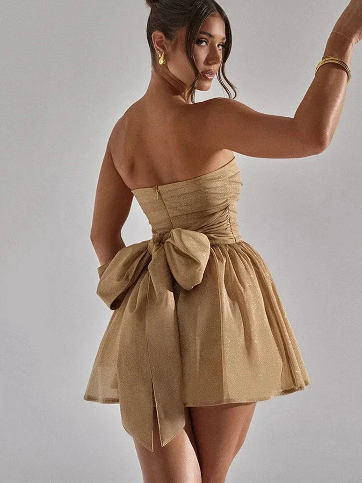 Sparkling strapless women's mini skater dress, ideal for parties, dances, or formal events.