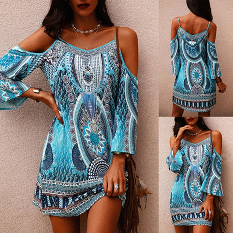 Women's strapless summer dress with vibrant ethnic print, perfect for beach or vacation.