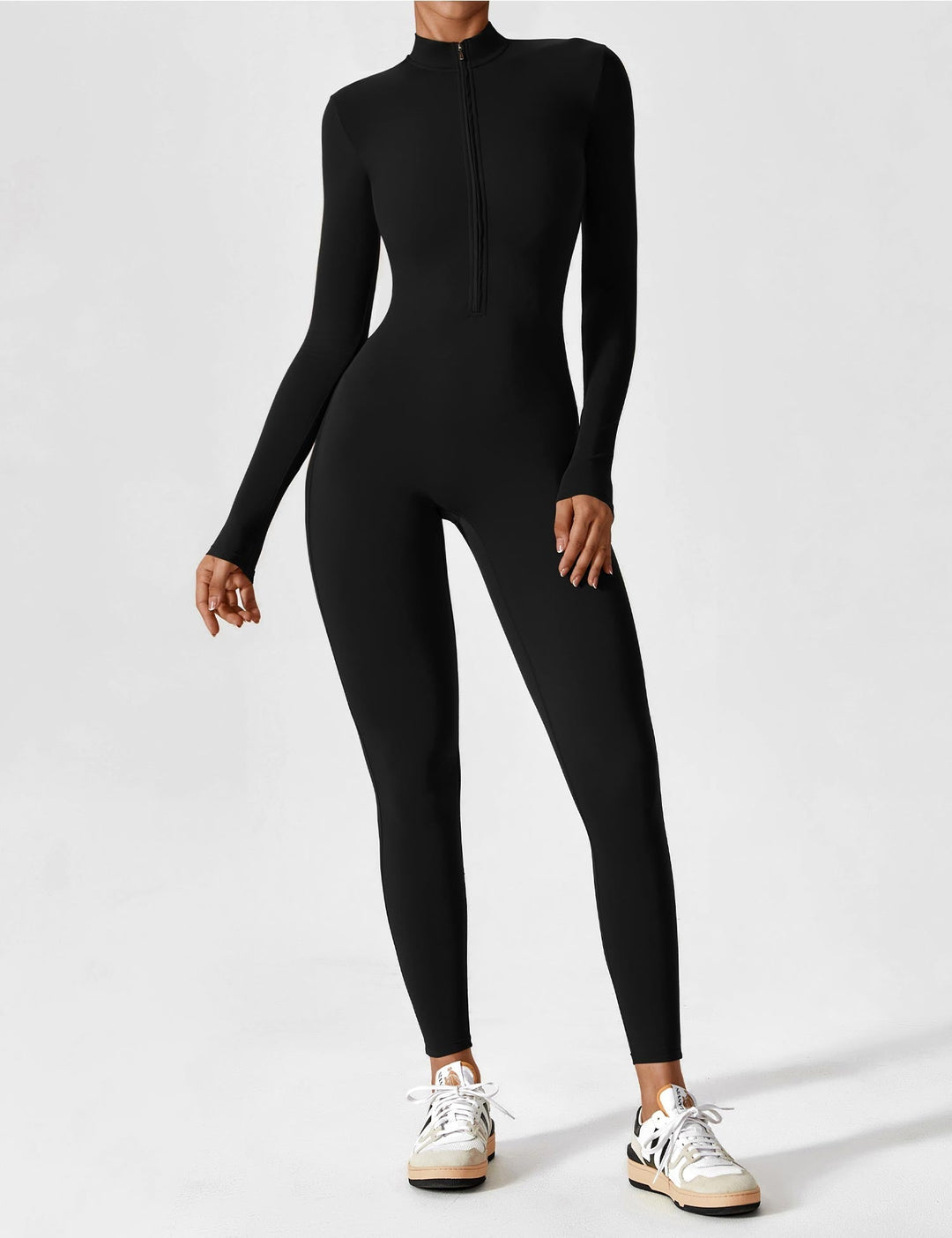 Close-up of the zipper detail on a women's casual stretchy spring jumpsuit, highlighting quality