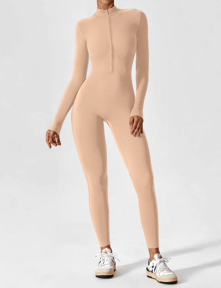 Woman enjoying a picnic in a comfortable stretchy zip-up jumpsuit, perfect for spring outdoors