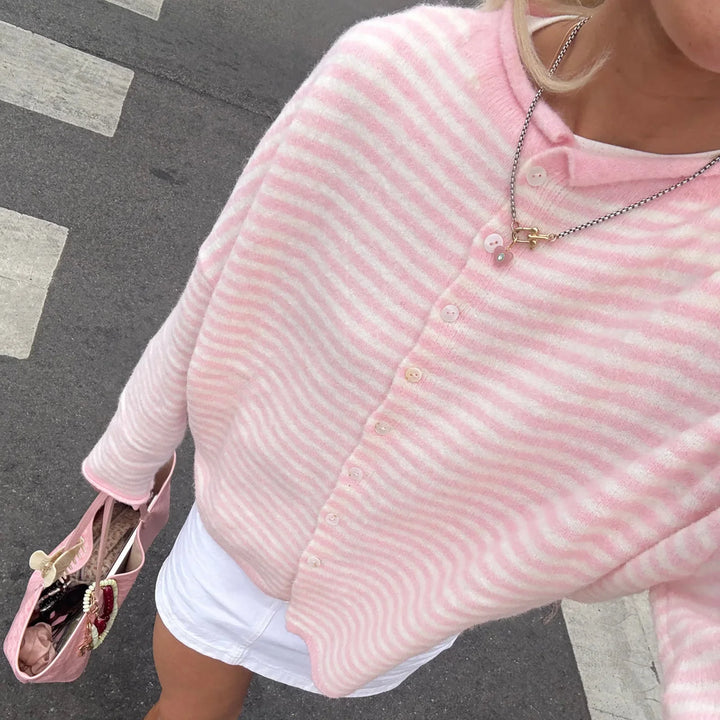 Casual chic women's striped cardigan with button front. Essential long-sleeve knitwear for versatile layering.
