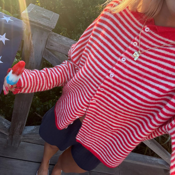 Striped women's button-front cardigan. Stylish long-sleeve knitwear, great for versatile everyday layering.