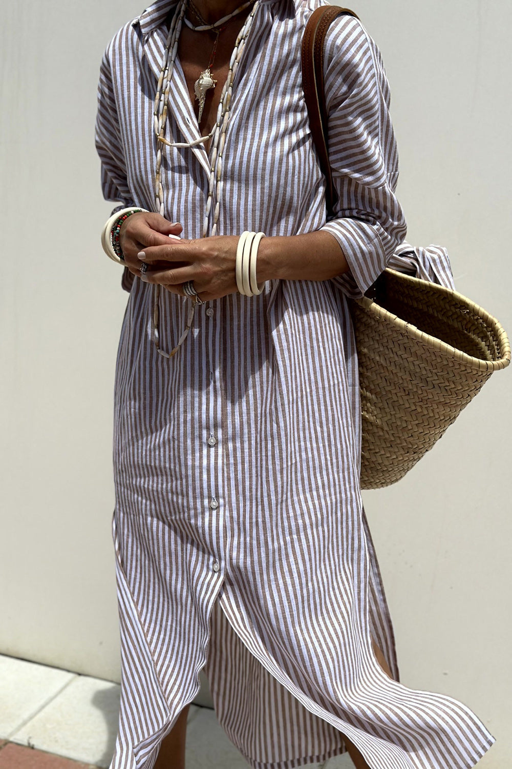 Women's collared striped button-down midi shirt dress, a comfortable and stylish summer beach essential.