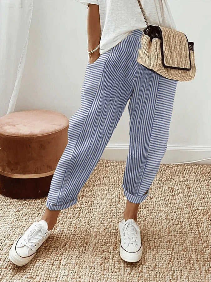 Women's striped cropped pants with convenient pockets. Casual straight leg, mid-rise pull-on design for summer comfort.