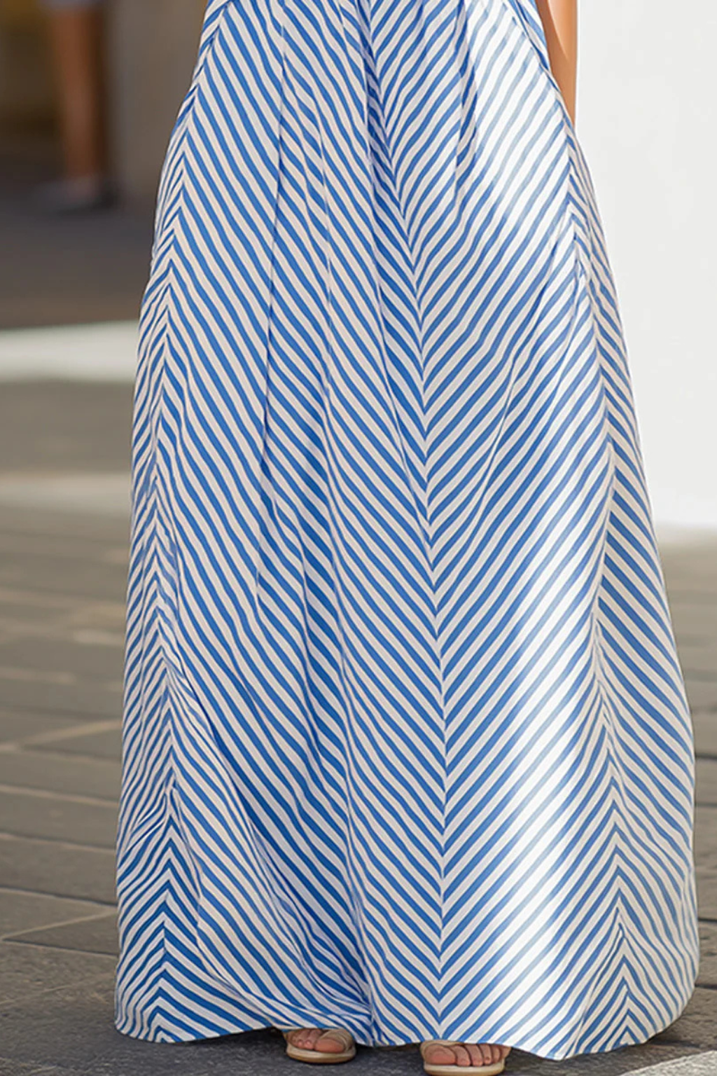 Striped halter neck sleeveless maxi dress for women, offering a relaxed, flowing A-line summer style.
