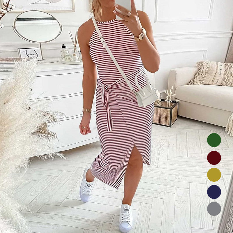 Women's striped halter neck summer dress with a flared hem, perfect for casual beachwear fashion.