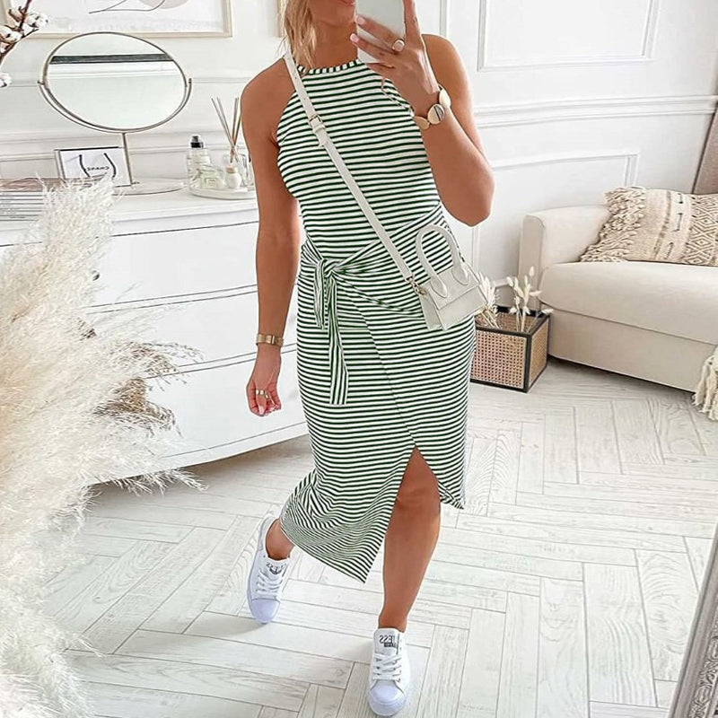 Women's casual striped dress with a halter neck and flowy flared hem, great for summer outings.