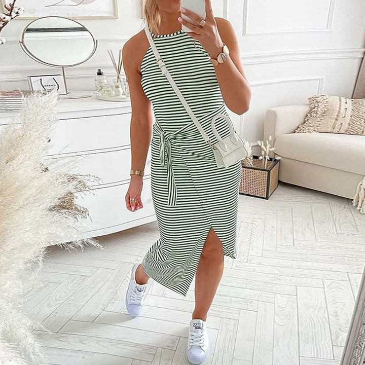 Women's casual striped dress with a halter neck and flowy flared hem, great for summer outings.