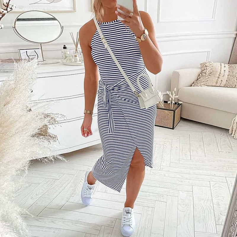 Detailed view of the fabric and striped pattern on a women's halter neck summer dress.