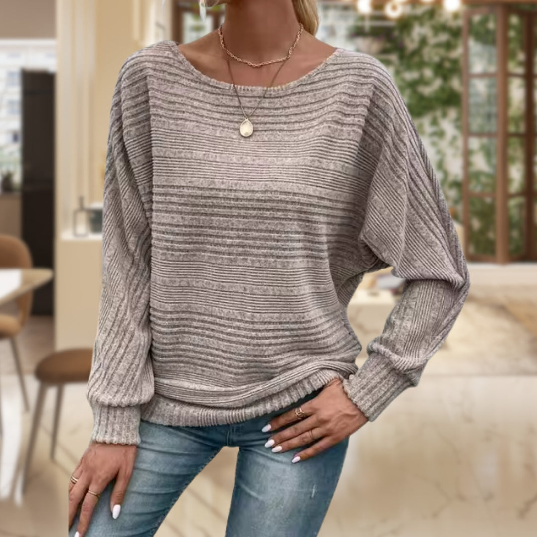 Women's striped knit jumper, classic style, perfect for casual everyday wear. Long sleeve pullover.