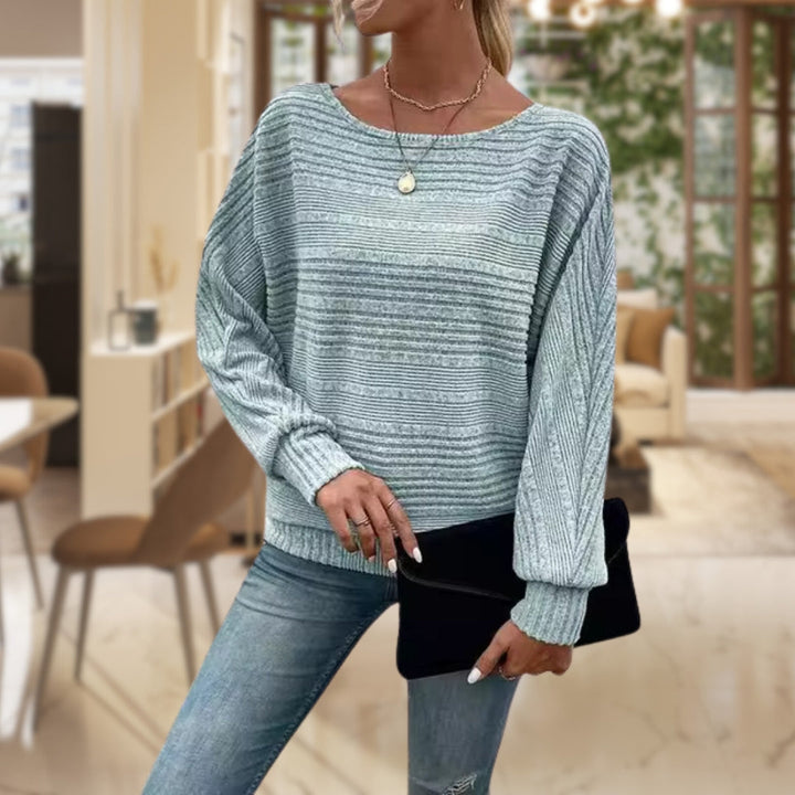 Comfortable women's striped knit jumper. Versatile long-sleeve pullover, ideal for fall fashion & everyday style.