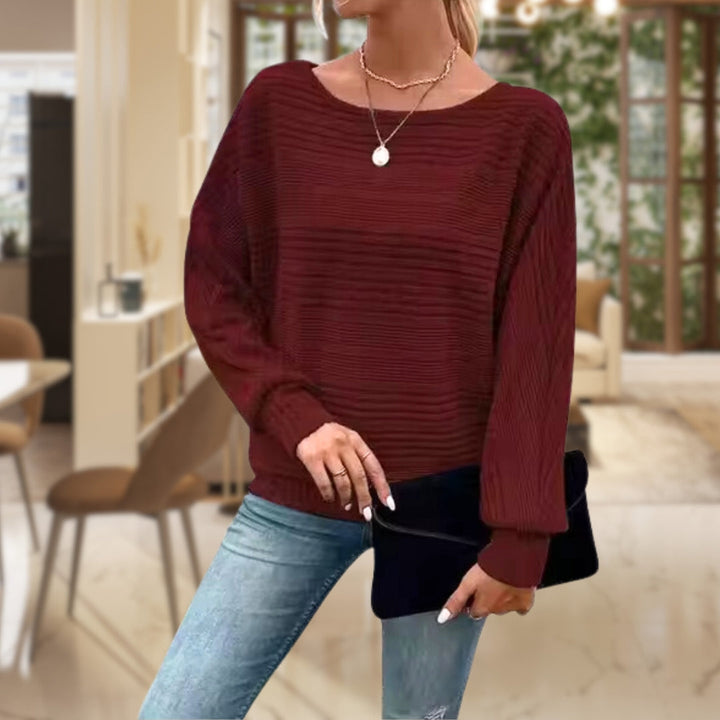 Stylish women's long-sleeve striped knit pullover. A classic and comfortable top for casual fall fashion.