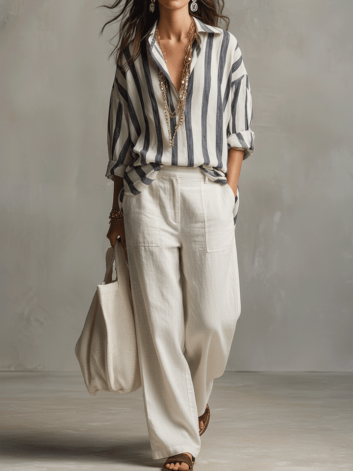 Women's long sleeve striped blouse. Button-front closure, relaxed fit, perfect for casual and everyday fashion.