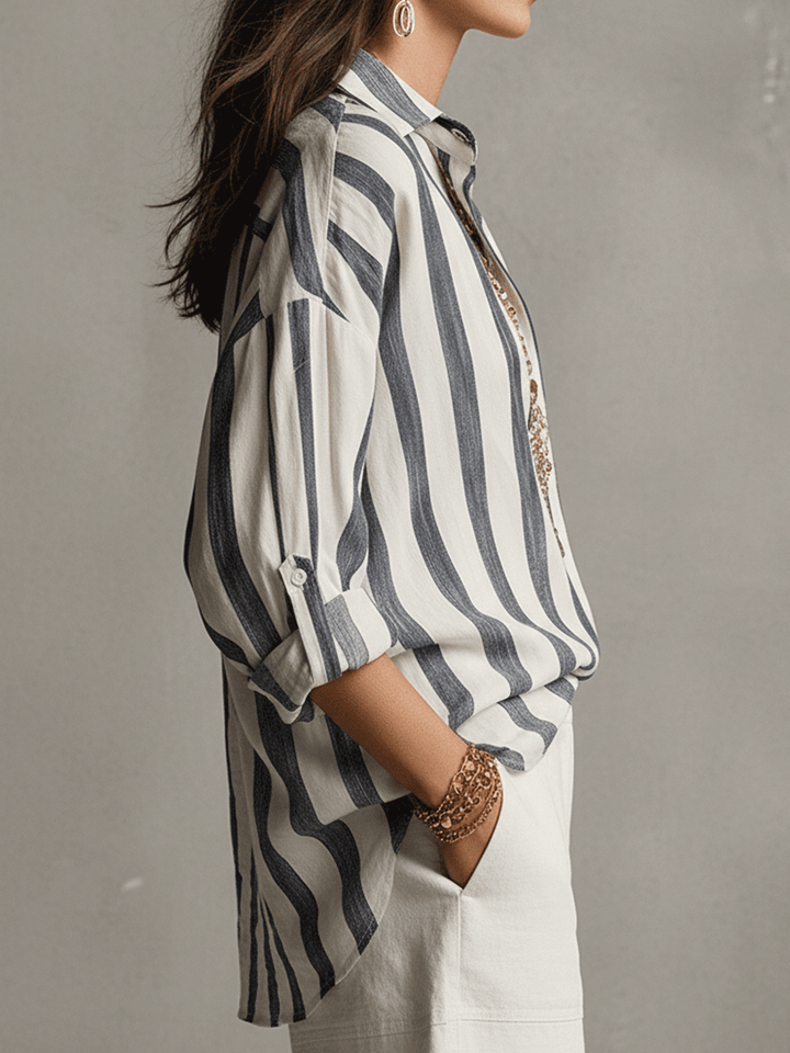 Elegant women's striped long sleeve blouse with a full button front. Perfect for a fashionable, relaxed fit.