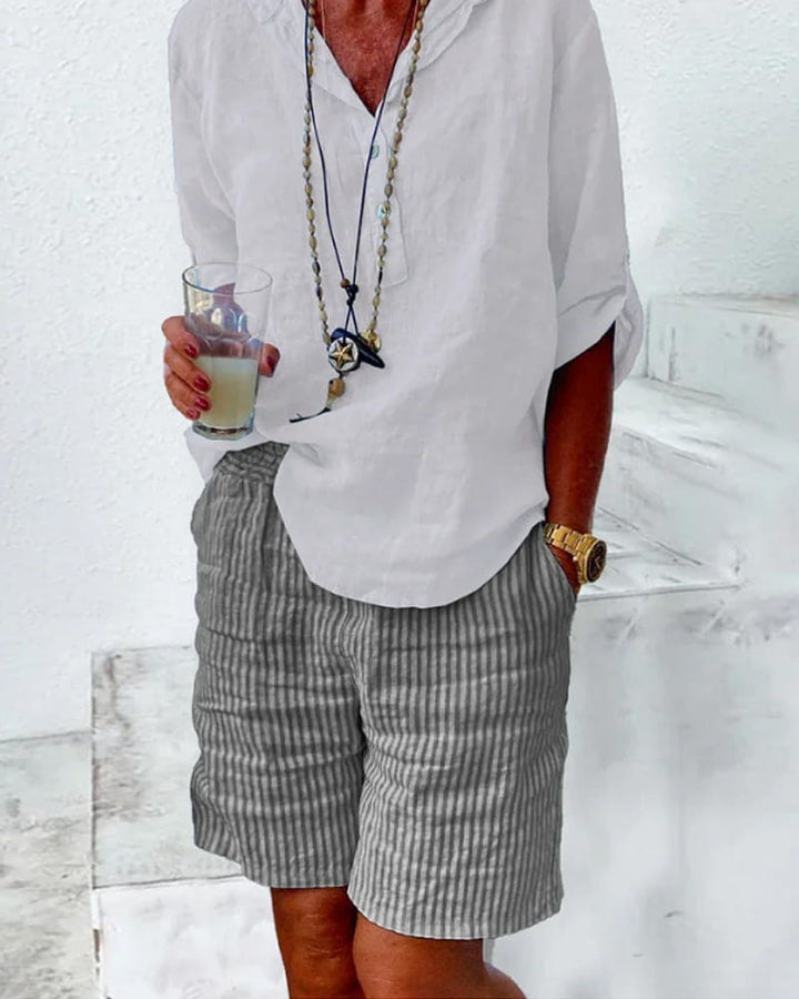 Casual women's striped summer shorts, mid-rise design with pockets, great for everyday comfort.