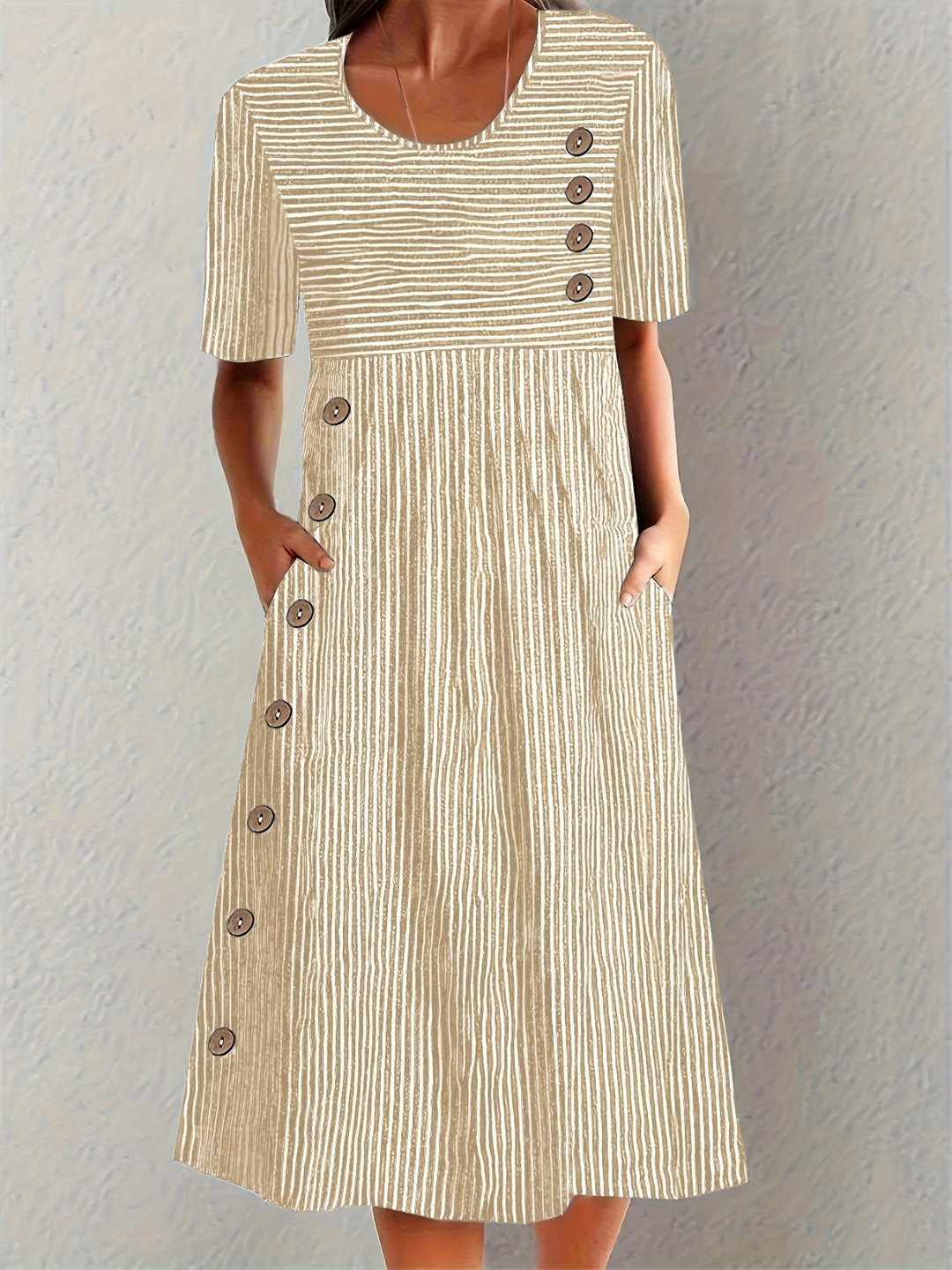 Casual striped midi dress for women, with button details. Great for summer style, everyday wear, and work outfits.