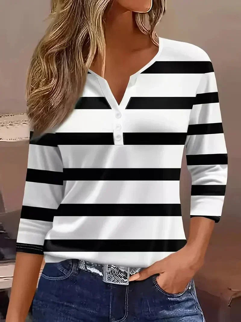 Elegant striped V-neck 3/4 sleeve top for women. Fashionable & comfortable casual blouse for spring/summer.