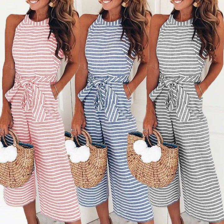 Trendy women's striped jumpsuit with a sleeveless wrap neck, offering a chic wide leg silhouette.