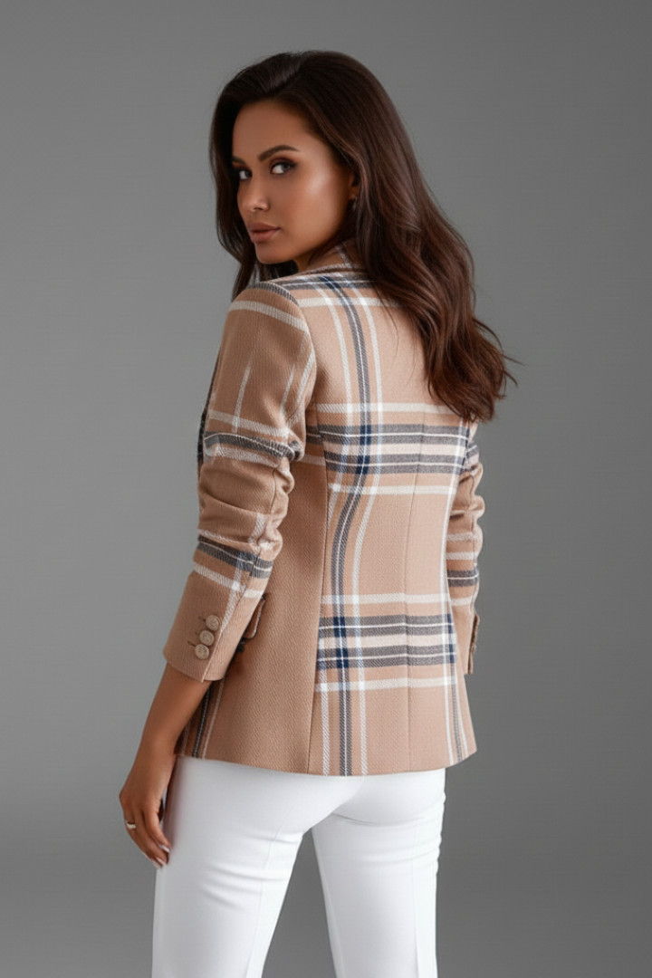 Elegant women's textured blazer with classic lapels, providing a polished and professional workwear look.