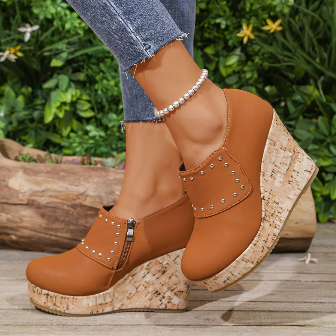 Women's Cork Wedge Sandals with studded accents, a versatile addition to any summer shoe collection