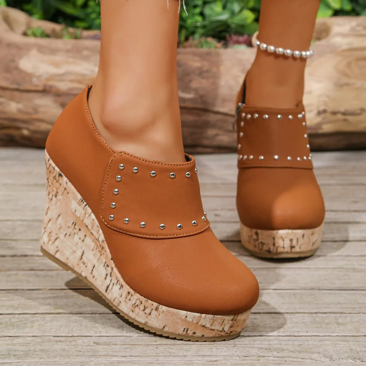 Side profile of Women's Cork Wedge Sandals, highlighting the natural cork sole and studded straps