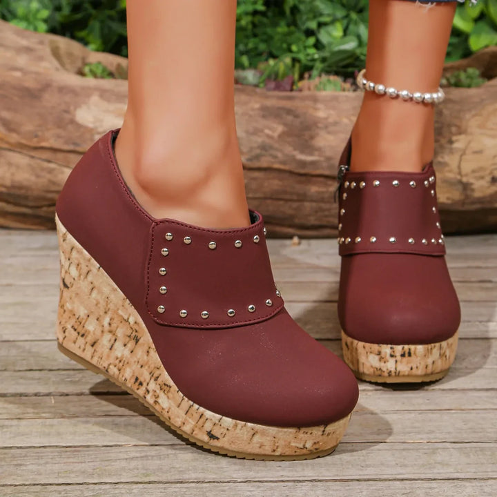 Pair of Women's Studded Cork Wedge Sandals, ready for warm weather and comfortable walking