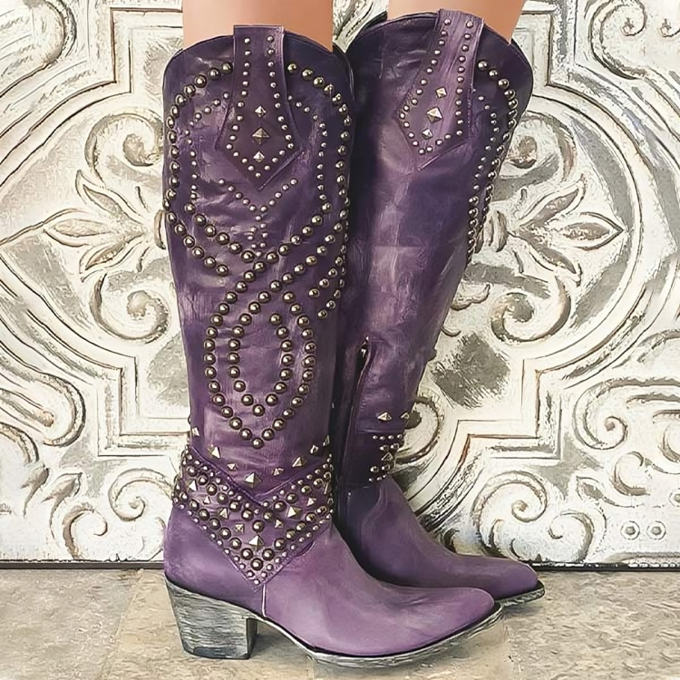 Women's studded knee-high western cowboy boots with pointed toe & block heel, perfect for bold fashion.