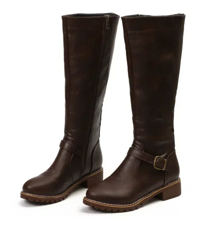 Women's versatile knee-high leather boots in tan, a staple for classic fall fashion footwear.