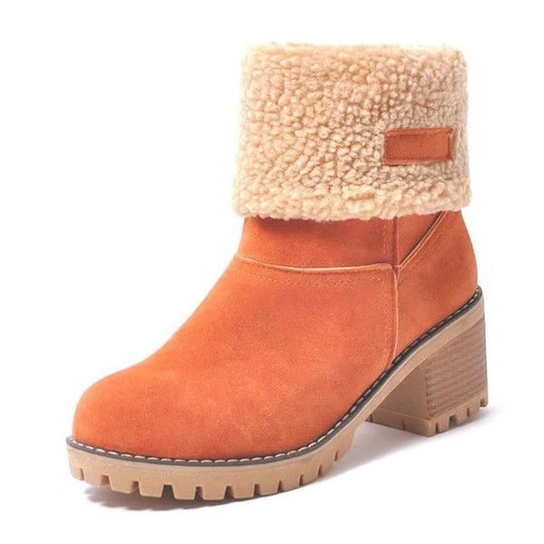 Fashionable women's slip-on block heel snow boots, warm and waterproof ankle boots for ultimate winter comfort.