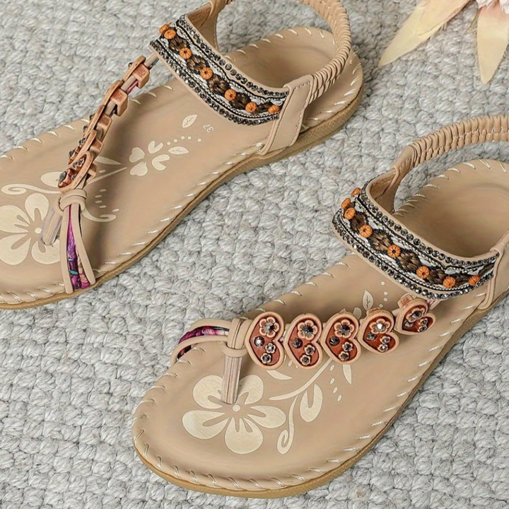 Fashionable women's bohemian summer sandals, elegant footwear for warm weather, beach & vacation.