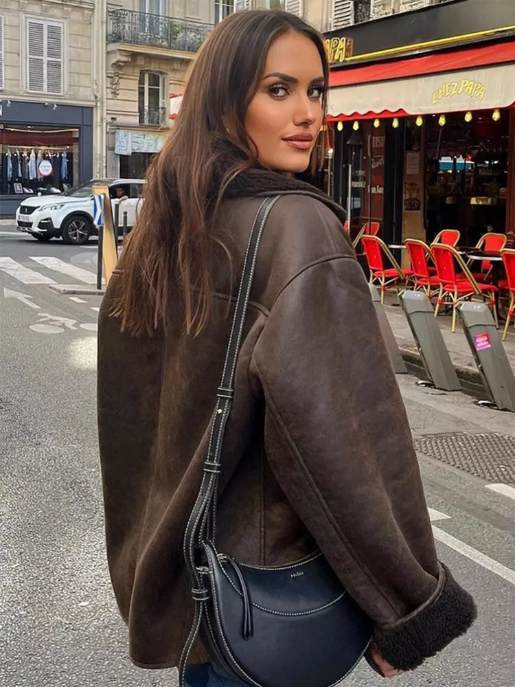 Classic women's double-breasted brown jacket, an elegant fall fashion outerwear staple