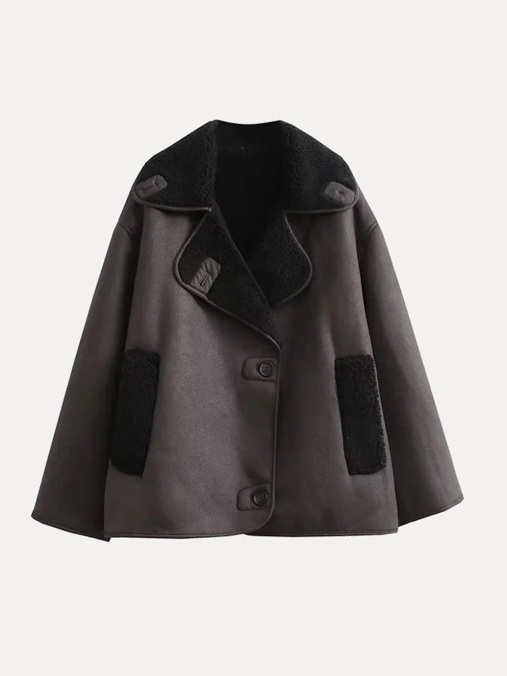 Elegant women's brown double-breasted jacket, ideal for classic fall fashion and cold weather