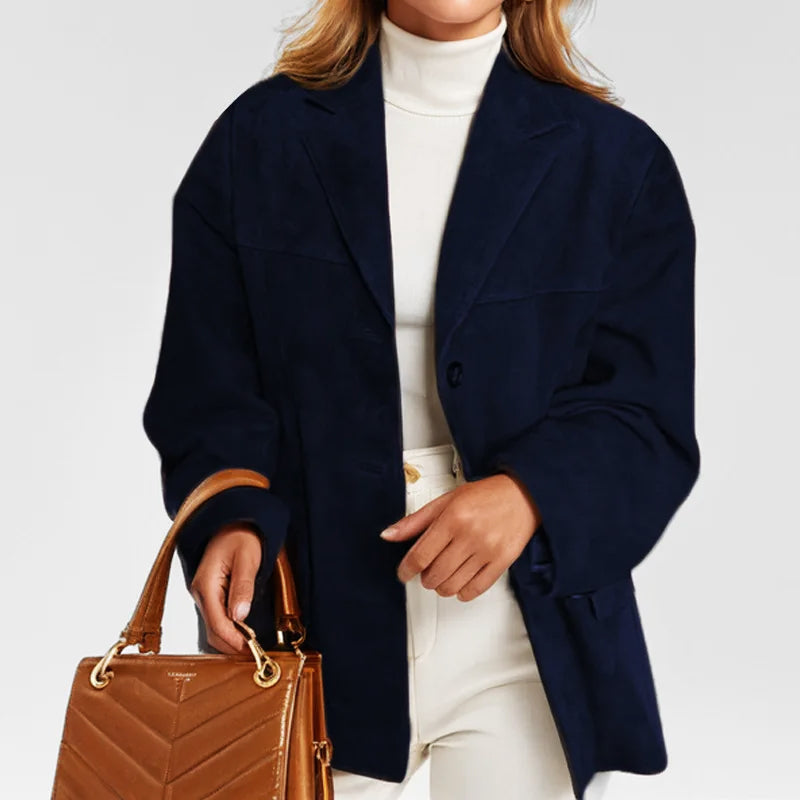 Tailored women's blazer jacket, featuring button-down front, ideal for office wear and fashion.
