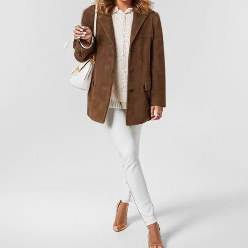 Fashion-forward women's blazer jacket with button details, suitable for chic office and casual looks.
