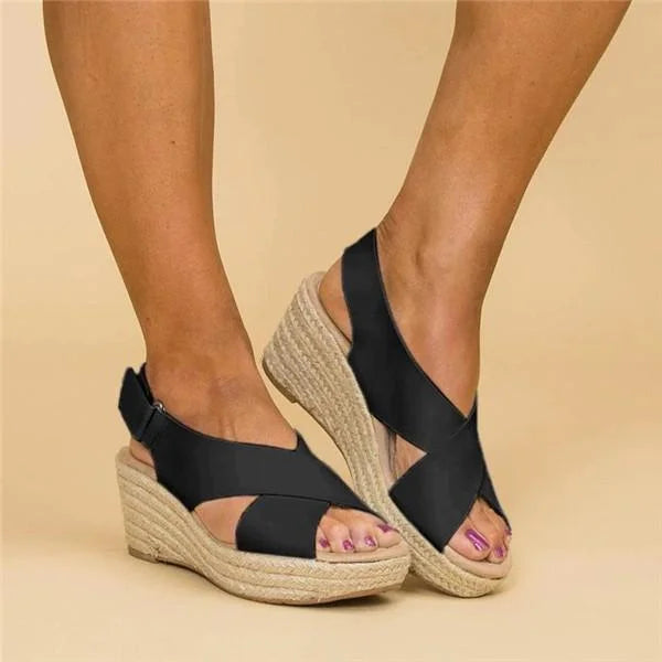 Stylish women's wedge espadrille sandals with a secure buckle ankle strap for summer.