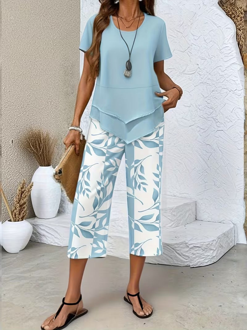Effortless women's leaf print matching set with relaxed fit pants, perfect for casual summer fashion.