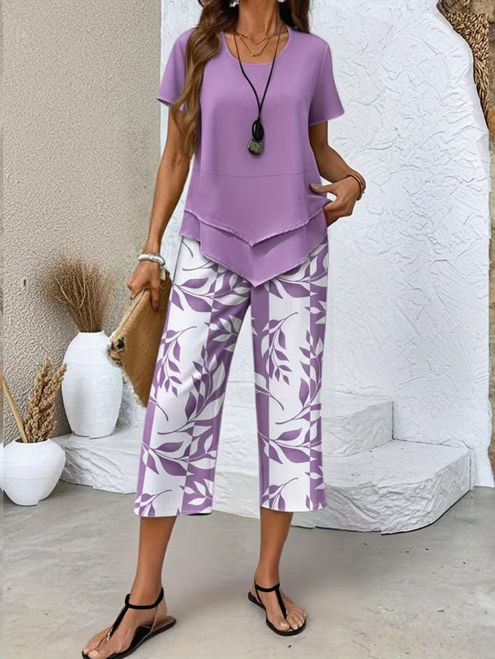 Trendy women's coordinated leaf print top and pant set, great for versatile casual wear.