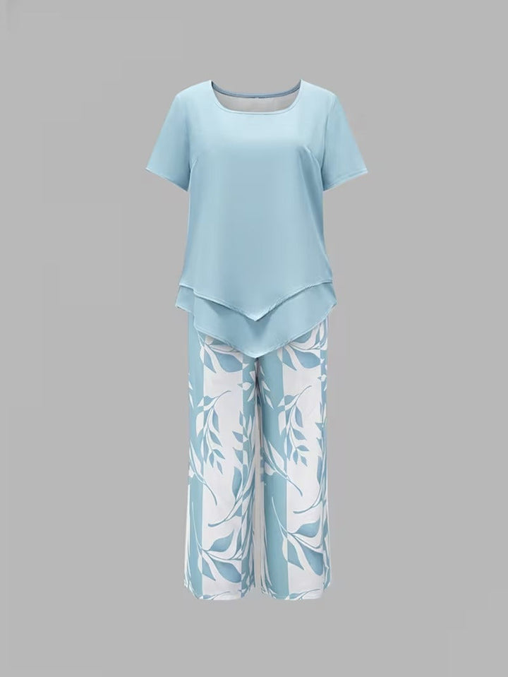 Stylish women's summer co-ord set featuring a vibrant leaf print, perfect for any casual occasion.