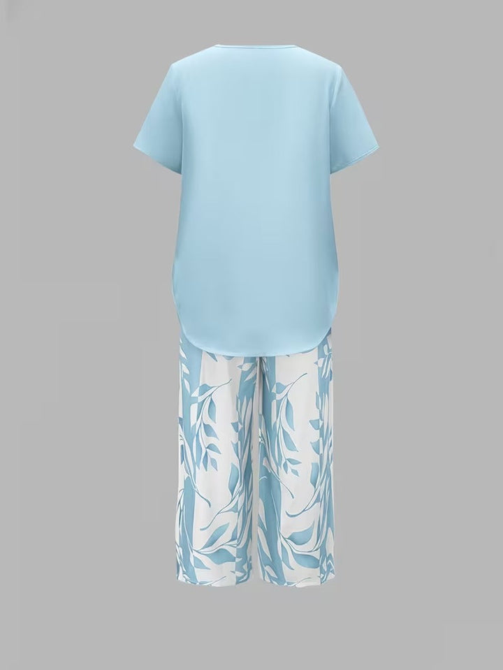 Fashionable women's leaf print two piece outfit, designed for effortless style and comfort.