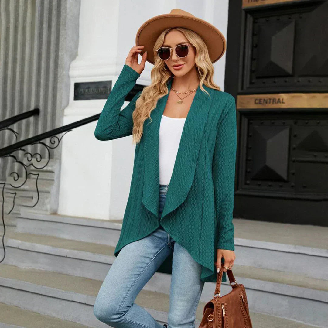 Women's stylish open front cardigan, perfect for fall fashion. Cozy long-sleeve knit sweater for autumn wear.